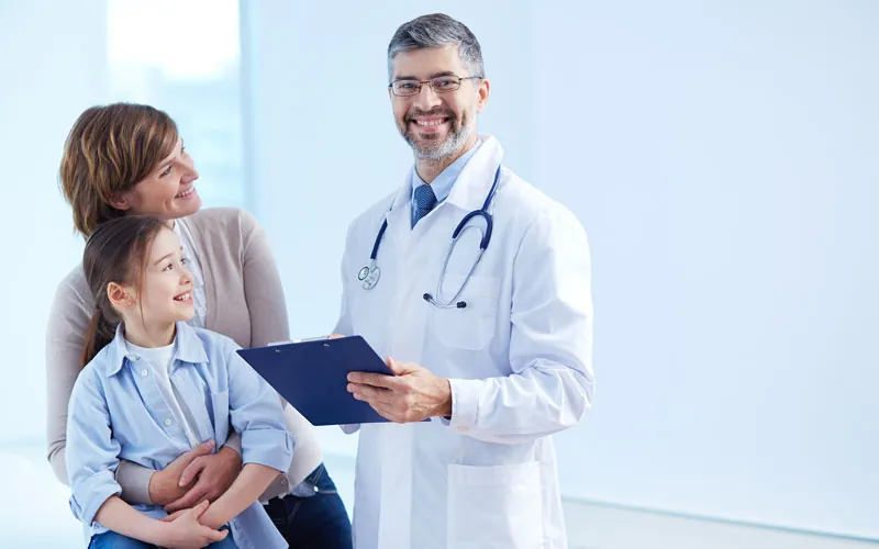 Caregiver assisting an older woman at home